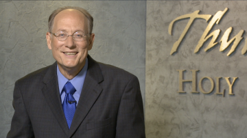 J. Fred Calkins, presenting Thunder in the Holy Land